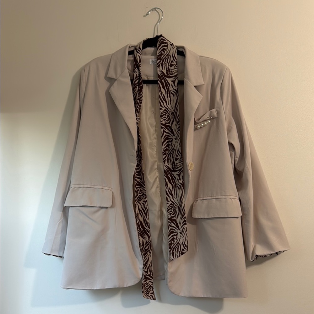 Beige Blazer with Patterned Accents